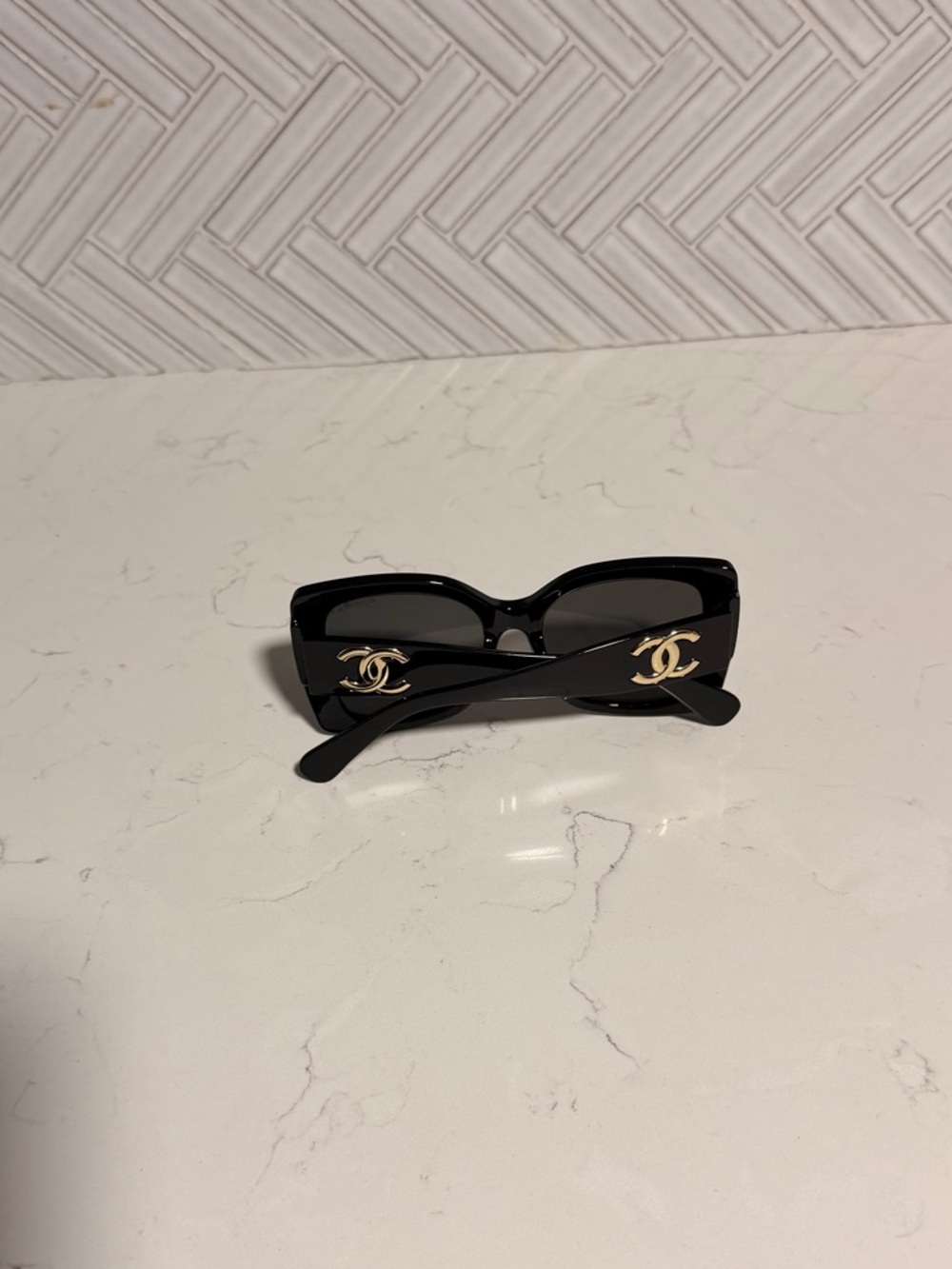 CHANEL Black Cat-Eye Sunglasses with Gold CC Logos